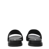 Sandalias Bottero negras con banda ancha de pelo sintético.