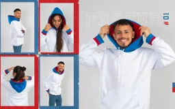 Canguro blanco con capucha forrada en azul y puños en rojo y azul. Diseño holgado con bolsillo delantero tipo canguro.