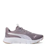 Championes Puma Flex Focus Lite Modern, color negro con detalles en dorado y suela blanca.
