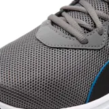 Championes Puma Incinerate de hombre color gris con detalles en negro y azul.