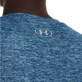 Remera Under Armour de mujer, color azul jaspeado, de corte amplio y tejido UA Tech™ de secado rápido.