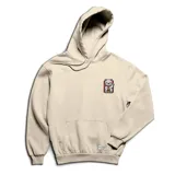 Canguro de algodón color crema con parche bordado de un gatito en el pecho y diseño minimalista.