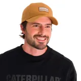 Gorra color tostado con parche bordado en el frente con el logo de Caterpillar y la leyenda "A Tractor Co. Since 1925". Tiene visera curva y correa ajustable en la parte posterior.
