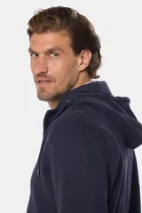 Canguro con cierre y capucha color bordó, confeccionado en felpa de algodón y poliéster.