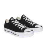 Zapatillas Converse Chuck Taylor All Star con plataforma, de cuero sintético negro, con cordones blancos y suela de goma blanca.