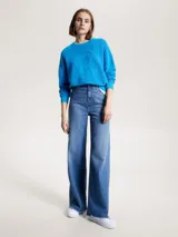 Sweater amplio de cuello redondo en color azul, confeccionado en tejido texturizado de algodón, con monograma tonal en la parte delantera.