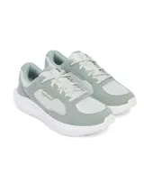 Zapatillas deportivas grises con detalles en celeste, marca Under Armour, modelo Charged Versurge.