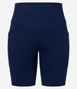 Bermuda deportiva color verde agua, de calce ajustado, con cintura ancha y confeccionada en poliamida.