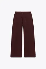 Pantalón de jean azul de corte ancho, tiro alto y efecto lavado.