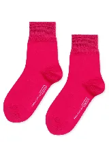 Medias de caña media color rosa claro.