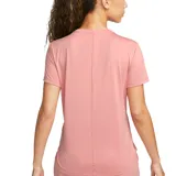 Remera deportiva Nike Dri-FIT One color salmón, de corte clásico y mangas cortas. Cuenta con tecnología Dri-FIT y logo de la marca estampado en el pecho.