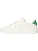 Zapatillas bajas Tommy Hilfiger color blanco con detalle verde en el talón y logo de la marca en el lateral. Confeccionadas en piel y poliuretano, con forro de poliéster y suela de goma.