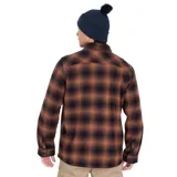 Camisa tipo chaqueta de franela a cuadros marrones y negros, con forro interior de tafeta. Tiene dos bolsillos con tapa en el pecho y dos bolsillos laterales.