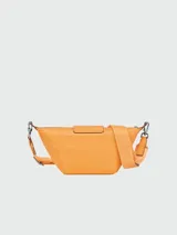 Bandolera Longchamp modelo Le Pliage Xtra XS, color amarillo mostaza, confeccionada en cuero.