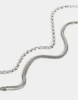 Set de dos pulseras plateadas, una con cadena de strass y otra con cadena snake.