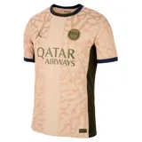 Camiseta de fútbol Nike del Paris Saint-Germain, modelo Stadium Fourth temporada 2023/24, para hombre. Diseño color chocolate con estampado de camuflaje y detalles en azul marino en cuello y mangas. Incluye logo de Nike, escudo del club y sponsor Qatar Airways en el frente.