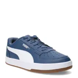 Championes Puma Caven 2.0 de cuero sintético azul con detalles en blanco y suela de goma marrón.