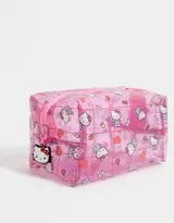 Cartuchera de PVC transparente con estampado de Hello Kitty, detalles de glitter y cierre superior con tirador de silicona.
