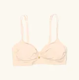 Soutien de microfibra color rosa pálido, sin aro y con breteles regulables.