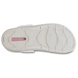 Zueco Crocs modelo InMotion, color lila pálido con suela blanca gruesa. Presenta orificios de ventilación en la parte superior y correa trasera pivotante con el logo de Crocs.