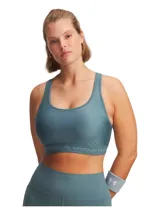 Top deportivo Under Armour color azul con espalda cruzada y logo en el frente.