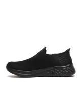 Championes slip-on negros de Umbro, con capellada de tejido flyknit y suela de phylon.