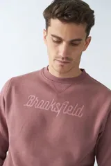 Buzo de felpa gris oscuro con logo estampado en el frente, cuello redondo, mangas largas y puños.