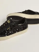 Zapatillas Golden Goose modelo Soul Star, color negro con lentejuelas y detalles en cuero.