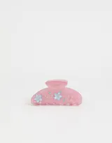 Broche para el pelo color rosa con apliques de strass y flores azules de acrílico.