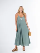 Vestido largo color verde agua, de bambula italiana, con breteles finos y corte suelto.