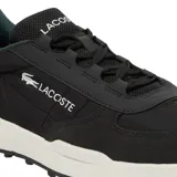 Championes urbanos Lacoste Elite Actv Evo, color negro con detalles en verde oscuro y logo del cocodrilo en blanco.