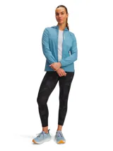 Calza larga deportiva Under Armour Launch Ankle Print para mujer, de tiro alto, corte ajustado y estampado abstracto en tonos grises.