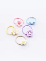 Pack de cinco gomitas de pelo con adorno de flor de plástico en colores pastel: rosa, celeste, lila, amarillo y blanco.