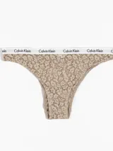 Bombacha brasileña de encaje floral con cintura elástica de Calvin Klein, semitransparente y de talle medio.