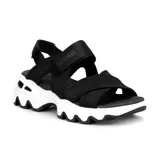 Sandalias Skechers Big Lug negras con tiras de nylon ajustables con velcro y suela chunky blanca.