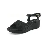Sandalias negras de plataforma con capellada con microperforaciones y pulsera al tobillo.