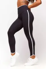 Calza deportiva azul marino con cintura alta y detalles en blanco en cintura y laterales.