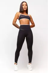 Calza larga deportiva azul marino con cintura alta y detalles en blanco en la cintura y laterales.