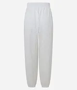Pantalón aladim color blanco con textura, cintura elástica y bajo con elástico.