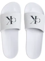 Ojotas blancas de Calvin Klein Jeans con logo CK en la tira.