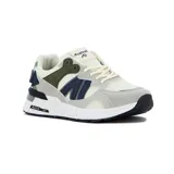 Championes de estilo running/lifestyle de la marca Austral, modelo Ushuaia Teen. Presentan una combinación de colores: base en blanco hueso/crema, superposiciones en gris claro, detalles en azul marino, verde oliva y un toque de azul oscuro en el talón. La mediasuela es blanca con salpicaduras negras y el logo de Austral 1997 es visible en el lateral del talón.