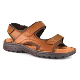 Sandalias marrones de cuero con tiras ajustables con velcro y suela de goma.