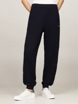 Pantalón de jogging azul marino, de corte cónico, con cintura elástica y logo bordado en la cadera.