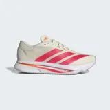 Championes de running Adidas Adizero SL 2, color crema con tres franjas laterales en color fucsia. La mediasuela es blanca con detalles en naranja y lleva la inscripción "LIGHTSTRIKE PRO".