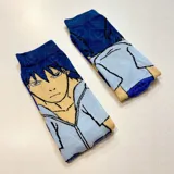 Par de medias de poliéster con diseño de Sasuke Uchiha del anime Naruto.