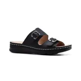 Sandalias negras con plantilla de cuero, dos tiras anchas con hebillas metálicas y suela con plataforma baja.