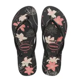 Sandalias Havaianas Slim Organic negras con estampado de flores en tonos rosa y blanco.