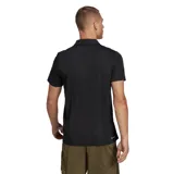 Chomba de piqué negra con logo Adidas blanco en el pecho.