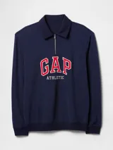 Buzo deportivo azul marino con medio cierre y logo Gap Athletic en rojo y blanco.