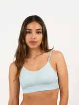 Top sin cierre color celeste con tirantes ajustables y diseño básico.